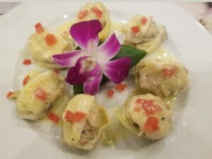 Lump Crab Artichoke Heart Topped with Roasted Pepper Hollandaise Drizzle